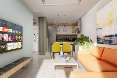 Bright, modern living room with open kitchen in Alanya property, featuring sleek finishes, vibrant accents, and ample natural light.