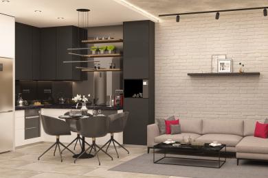 Moderní kuchyně s otevřeným konceptem a obývací prostor v tomto apartmánu v Alanyi se vyznačuje elegantními černými skříňkami, cihlovou zdí a stylovým osvětlením.