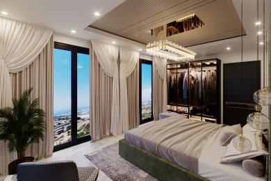 Camera da letto di una proprietà ad Alanya con cabina armadio, ampie finestre con vista sulla città ed eleganti tonalità neutre.