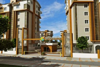 Alanya eiendom inngang med moderne leilighetsbygg, treaksenter og en lys og innbydende atmosfære.